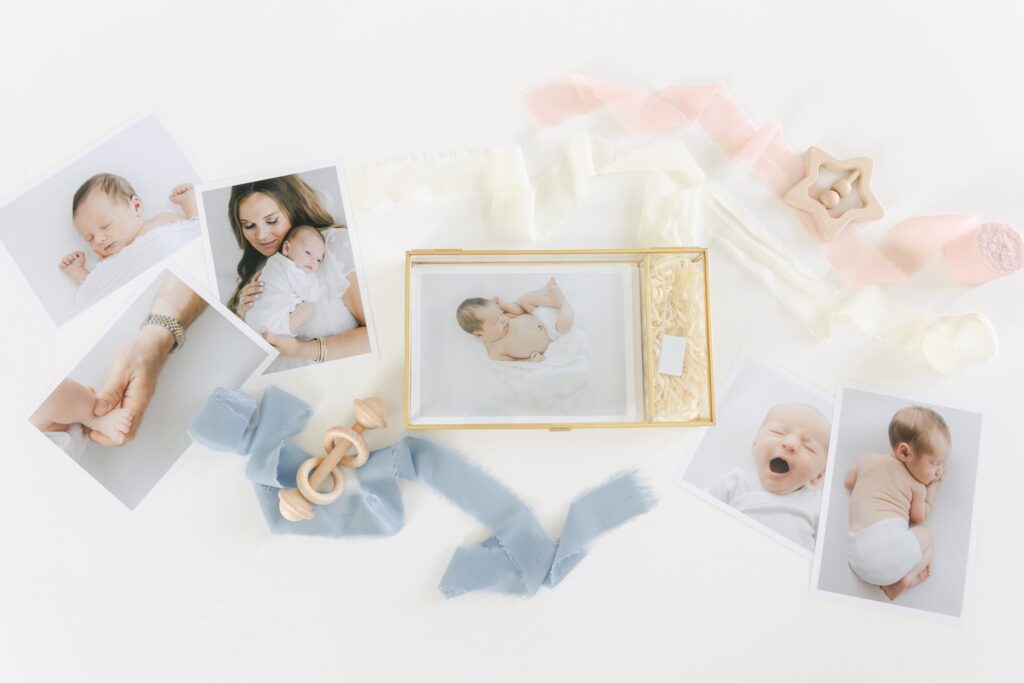 Flat lay of framed newborn photography in Shreveport