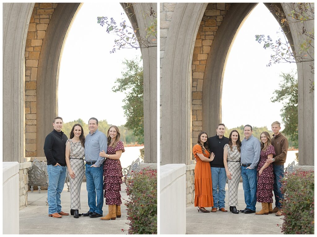 Family standing under church bell tower.