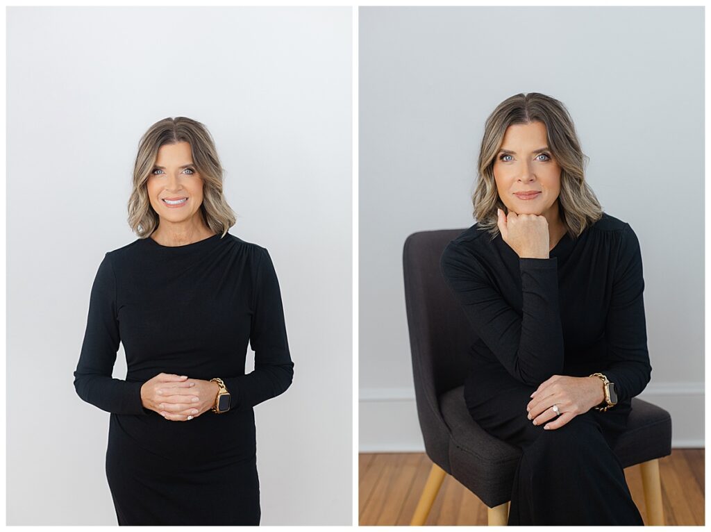 Woman in black long sleeve dress posing with white backdrop