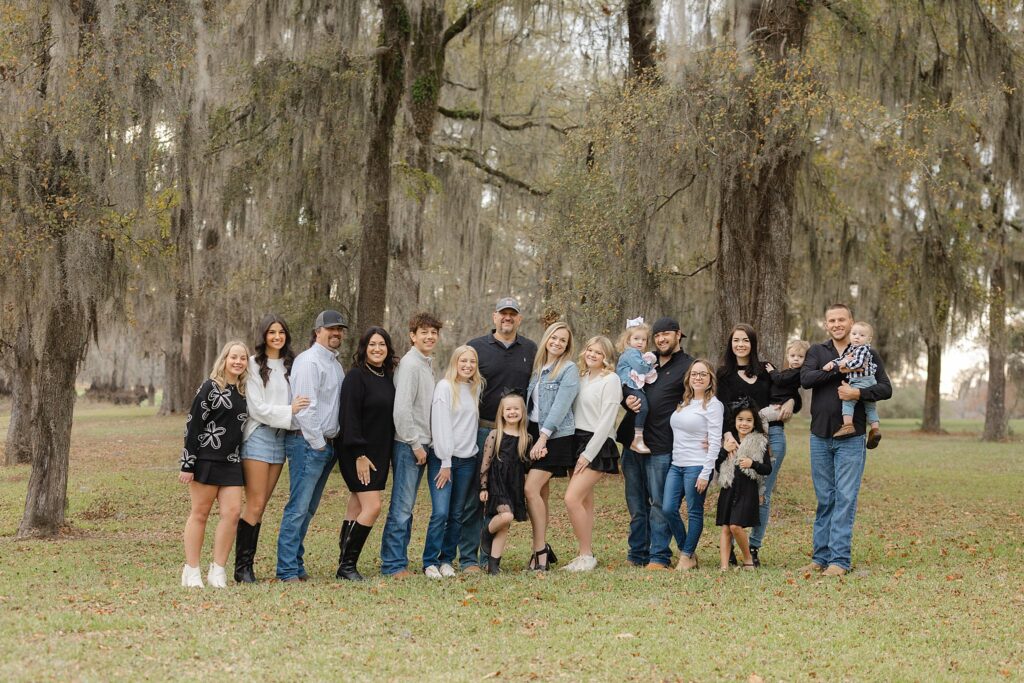 Posed extended family photo of 18 people near Lake Bistineau in Shreveport–Bossier.