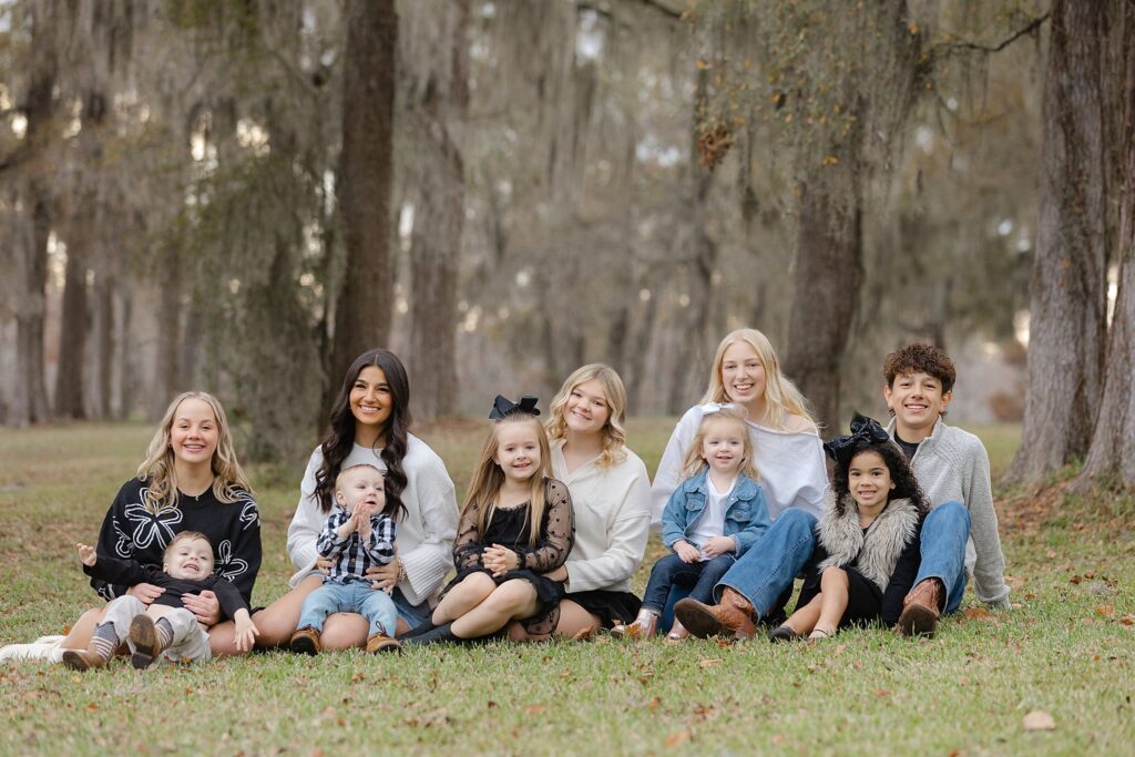 Coordinated black, white, and denim outfits during a posed family session in Shreveport–Bossier.