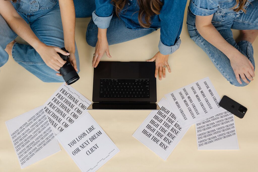 Brand photography of High Tide Rise collaborating and planning growth strategies.