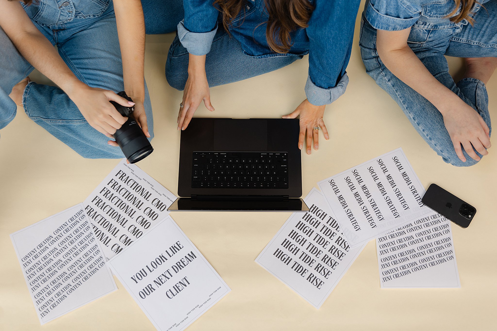Brand photography of High Tide Rise collaborating and planning growth strategies.
