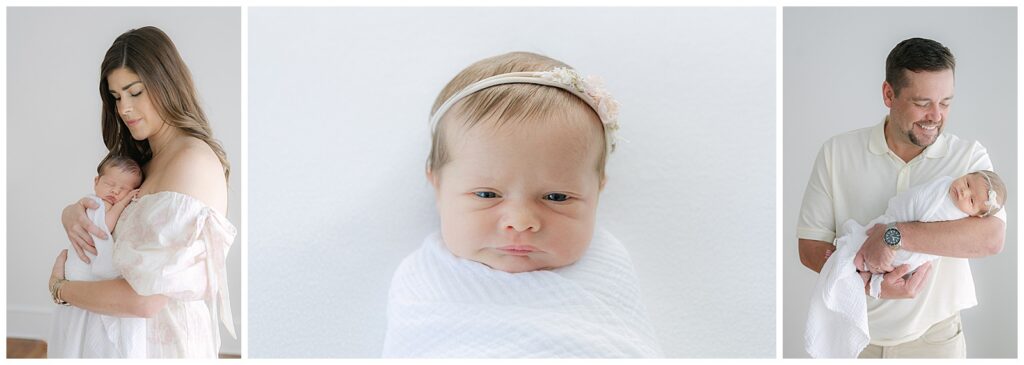 Benton newborn photographer capturing mother holding wrapped newborn baby
